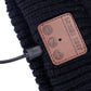 Bluetooth beanie control patch close-up with buttons and attached headset cable