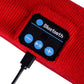 Red knit Bluetooth control module with blue buttons and wired connector