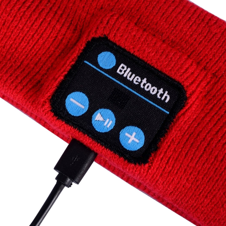 Red knit Bluetooth control module with blue buttons and wired connector