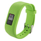 Green silicone smartwatch band with digital screen, metal pin, and vented holes