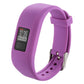 Purple silicone smartwatch band with digital screen, metal pin, and vented holes