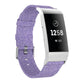 Light purple woven nylon watch band with metal clasp and adjustment holes