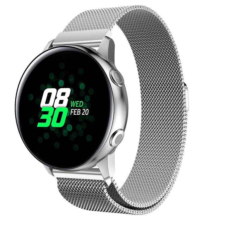 Silver stainless steel mesh watch band with smartwatch and dark display