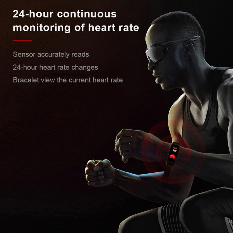 Black smart bracelet worn on wrist with illuminated heart-rate sensor indicator.