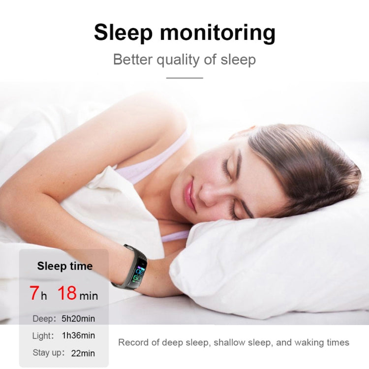 Smart bracelet on wrist beside sleeping person, with dark screen face.