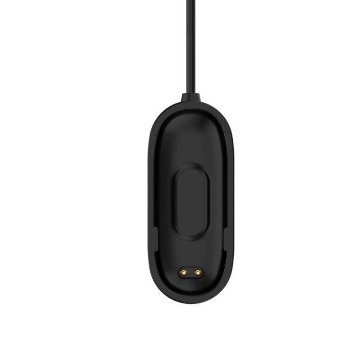 Black magnetic charging dock with gold charging pin contacts