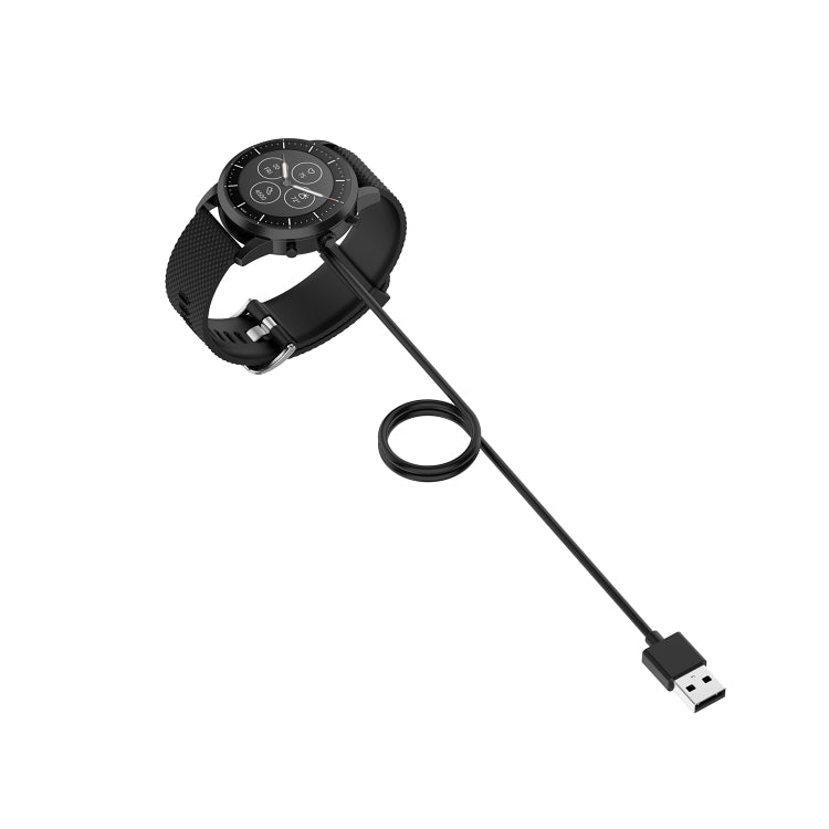 Fossil hybrid smartwatch charging cable with round dock connected to smartwatch