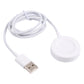White charging puck with coiled USB-A cable and short round magnetic dock