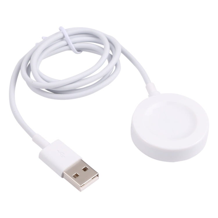 White charging puck with coiled USB-A cable and short round magnetic dock