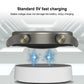 White wireless charging dock with watch positioned on top for charging