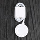 White round magnetic charging dock with attached cable and connector