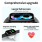 Smart watch on charging cable with heart-rate monitoring icon