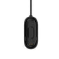 Black oval charging cradle with contact pins on a charging cable