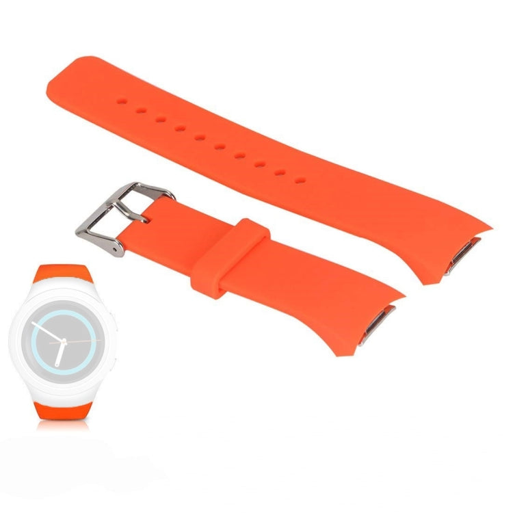 Orange silicone watch band with metal buckle clasp and perforated holes