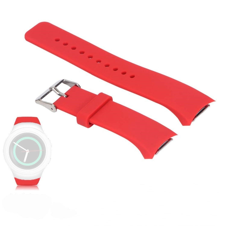 Red silicone watch band with metal buckle clasp and perforated holes
