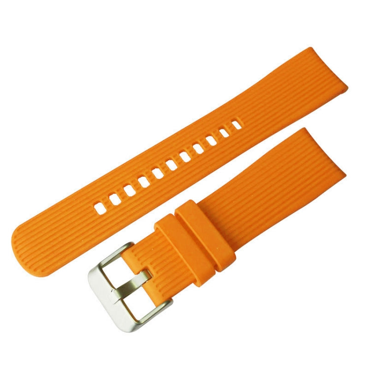 Orange rubber watch band with vertical grain texture and metal buckle clasp