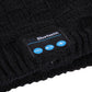 Bluetooth control patch on black knit beanie with blue buttons and icons