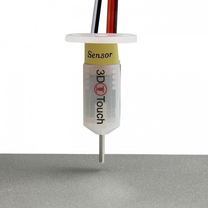 Bed leveling sensor with probe pin mounted above gray surface, wired module