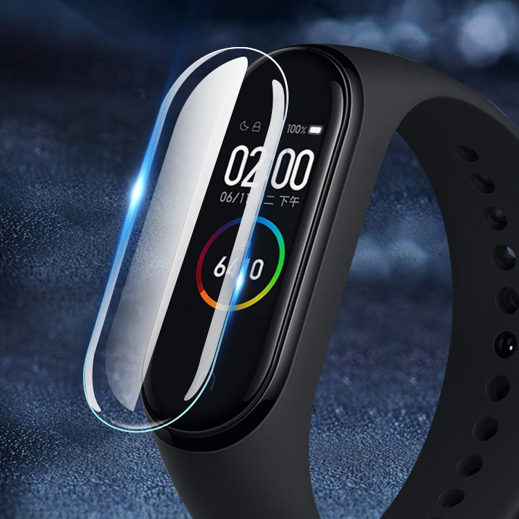 Clear PET screen protector film for fitness tracker display, curved for full coverage