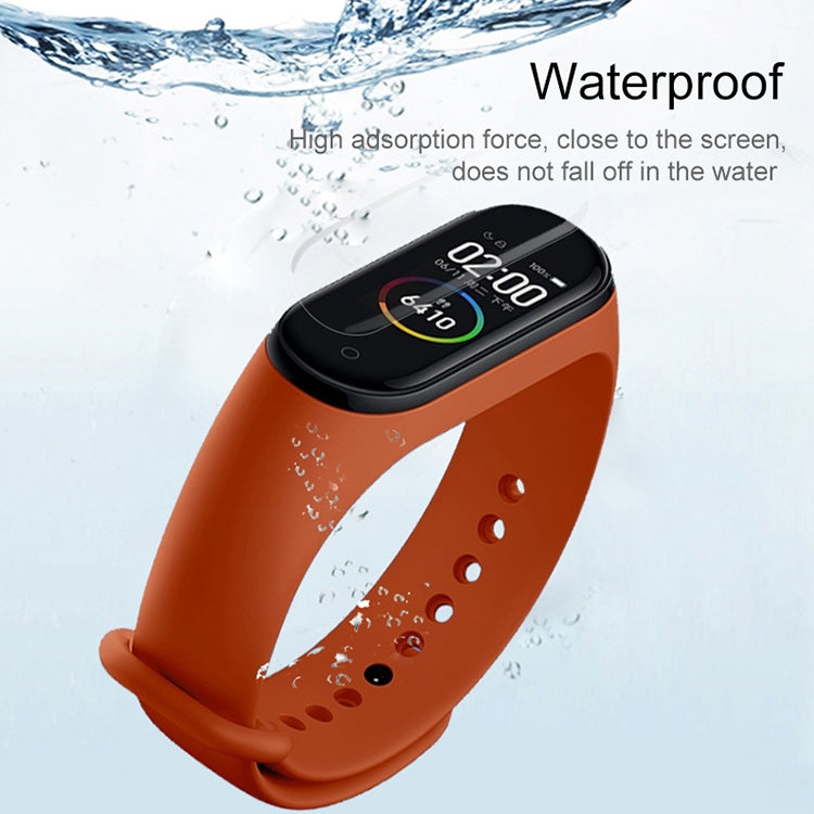 Clear PET screen protector film on fitness tracker display, water-resistant coverage