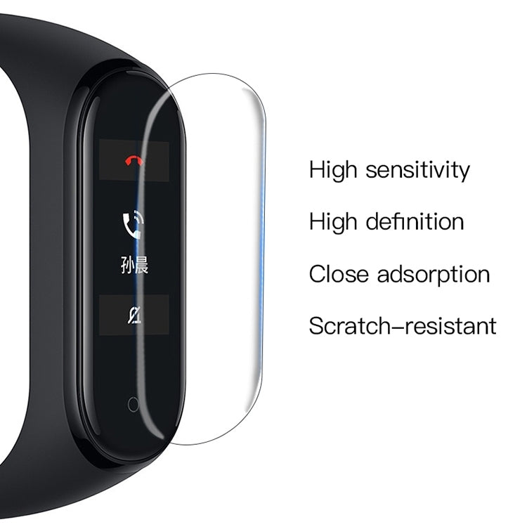 Clear PET screen protector film on fitness tracker screen, close-adhesion fit
