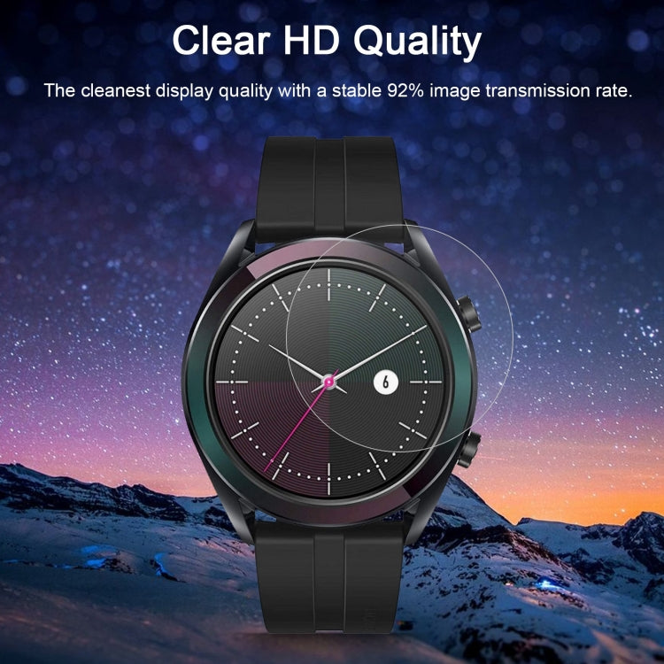 Clear tempered glass screen protector film on round smartwatch display