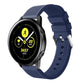 Dark blue silicone smartwatch band with perforated strap and metal buckle hardware