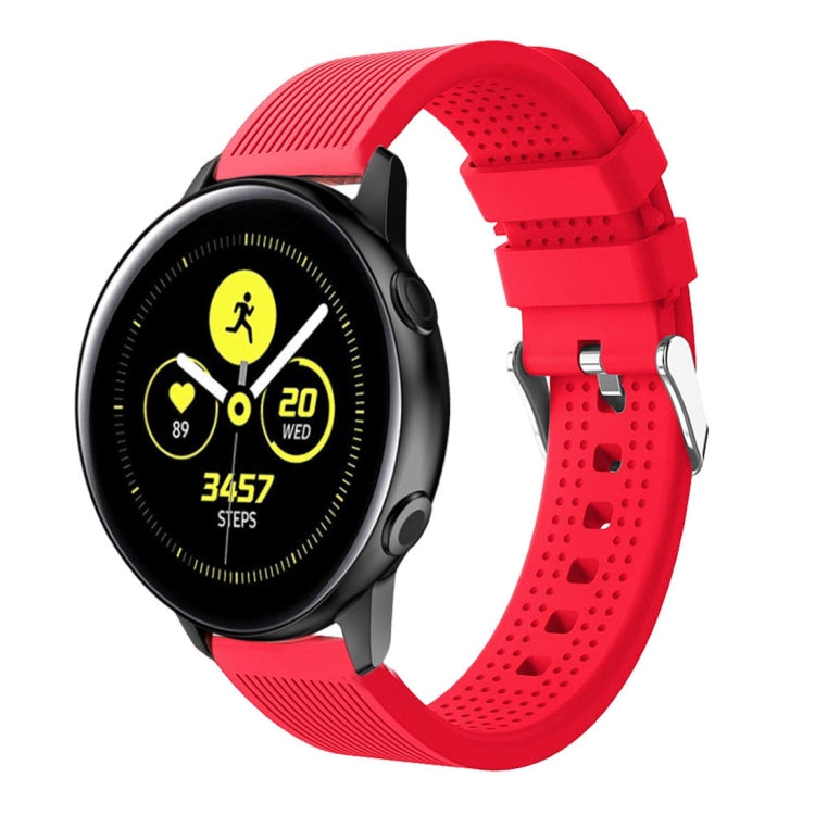 Red silicone smartwatch band with perforated strap and metal buckle hardware