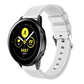 White silicone smartwatch band with perforated strap and metal buckle clasp