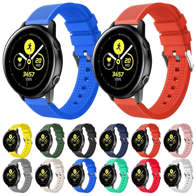 Set of silicone smartwatch bands in multiple colors, perforated straps with buckles