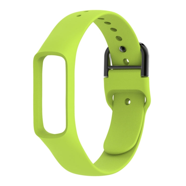 Green silicone watch band with metal buckle and perforation holes for smartwatch watch face.