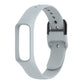 Gray silicone watch band with metal buckle and perforation holes for smartwatch fit.