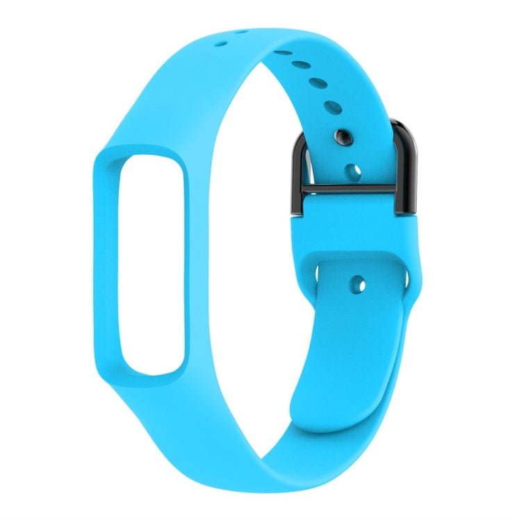Blue silicone watch band with metal buckle and perforation holes for smartwatch watch case.