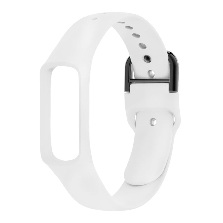 White silicone watch band with metal buckle and perforation holes for smartwatch fit.