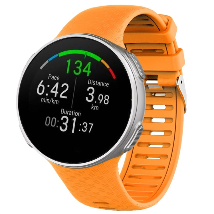 Polar Vantage V silicone watch band in orange, with metal buckle and watch case