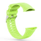 Bright green silicone watch band showing underside and fold-over keeper