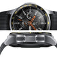 Close-up of black watch protective bezel with silver guards and orange dial accents