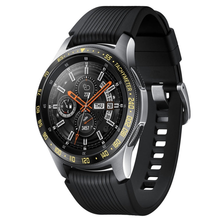 Black watch with steel dial protector and ribbed silicone strap, yellow markings