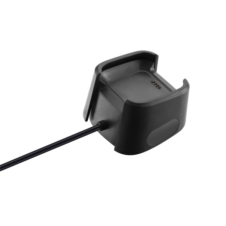 Black smartwatch charging dock adapter with side details and cable attached