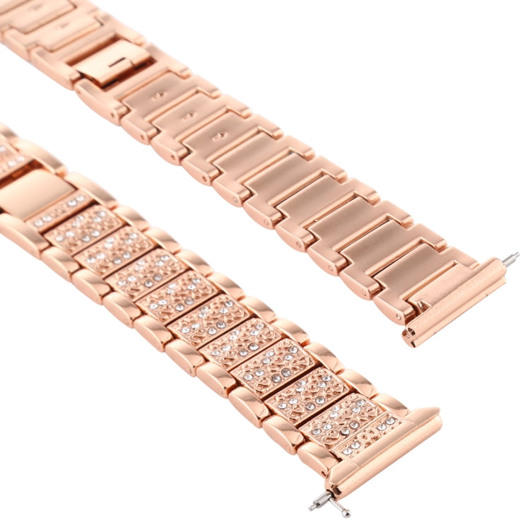 Rose gold diamond-studded watch band close-up, rectangular stone rows on metal links