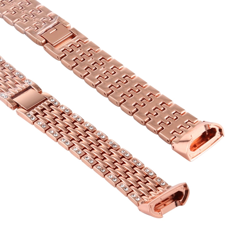 Rose gold diamond-studded watch band, close-up of link rows and stones