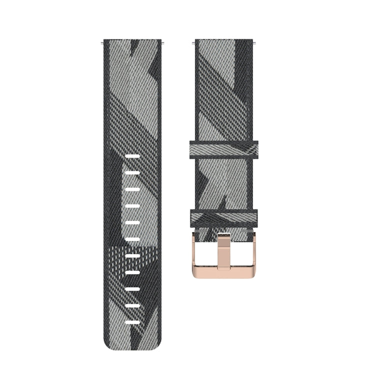 Grey striped nylon watch band showing buckle and adjustment holes.