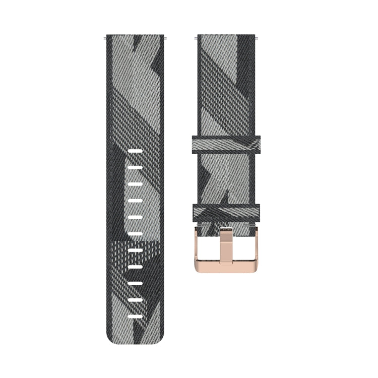 Grey striped nylon watch band end with metal buckle and clasp.
