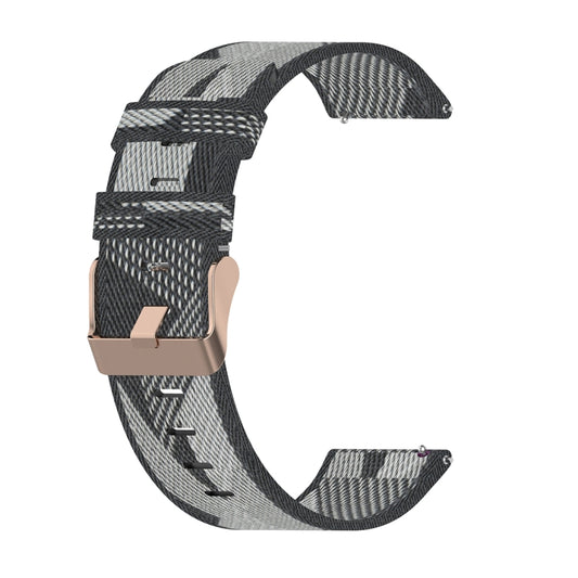 Grey striped nylon watch band with adjustable strap and metal buckle.