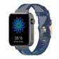 Blue striped nylon watch band with buckle and multiple adjustment holes.