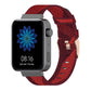 Red striped nylon watch band with metal buckle and adjustable pin holes.