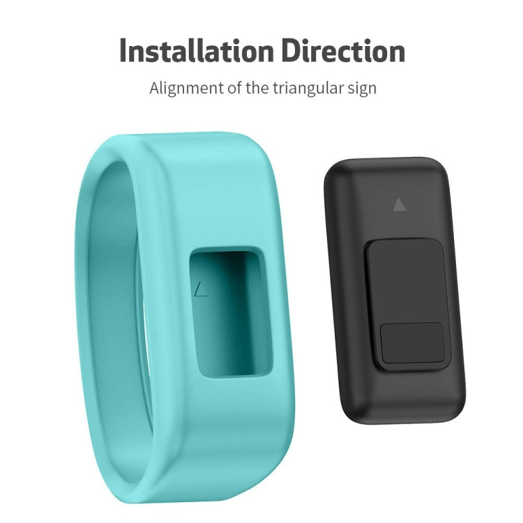Small mint green silicone sport watch band with separate black band shown for fit