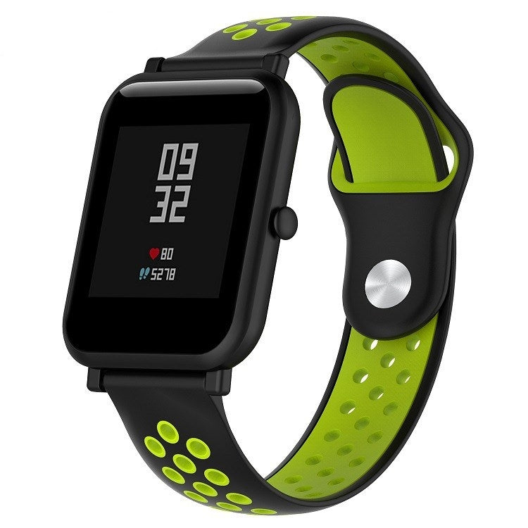 Silicone sport watch band with black and lime green perforated straps, black watch case