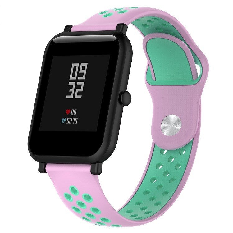 Silicone sport watch band with lilac purple and mint green perforated straps, black watch case