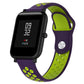 Silicone sport watch band with purple and lime green perforated straps, black watch case